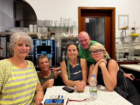 Group of people in a cafe setting.