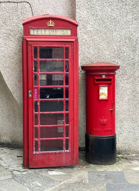 Red telephone box and post box.