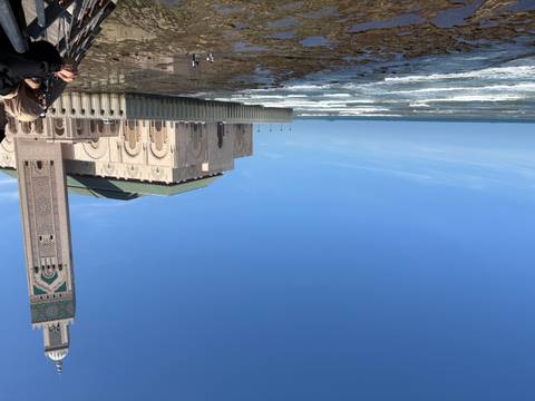       View of the Hassan II Mosque by the sea.
  