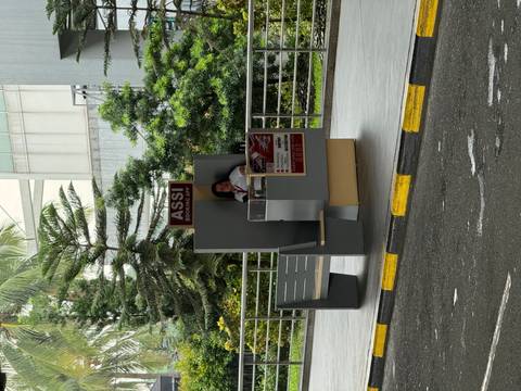Woman at a booking app kiosk.