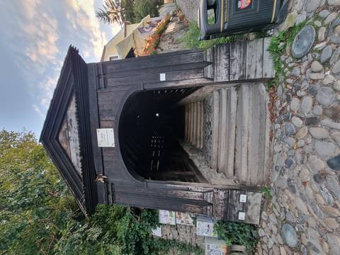       Old wooden covered staircase with historic feel.
  