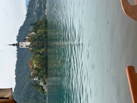 Charming island with a church surrounded by a lake.