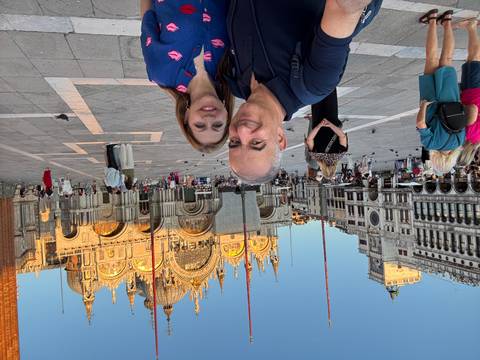Couple in front of Saint Mark's Basilica in Venice.