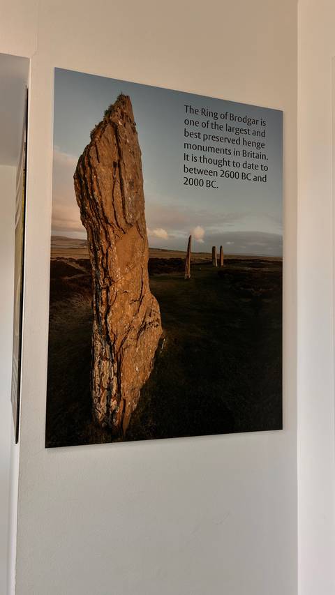 A detailed close-up of standing stones on a wall.