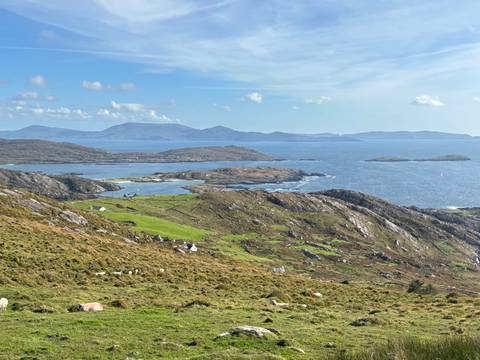 View of a coastal landscape with islands in the distance.