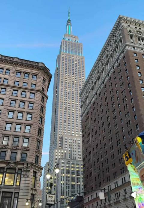 Tall buildings in a bustling cityscape.
