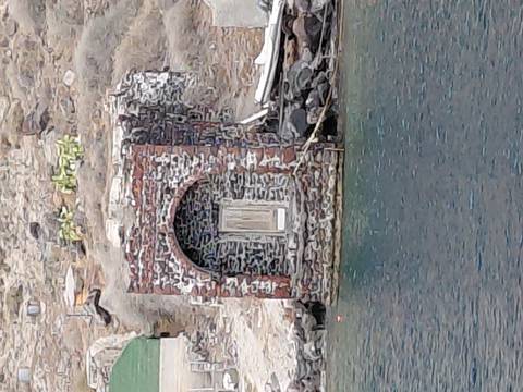 Stone structure by the waterfront.
