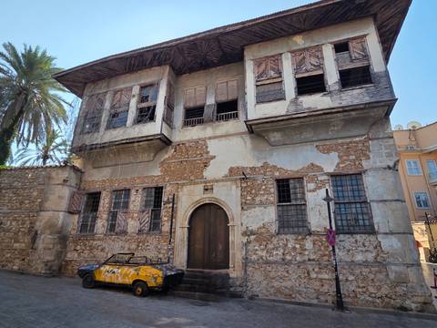 Historic building with aged facade in a city.