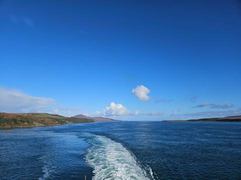       Open water view with a cloudy sky.
  