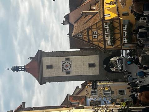       Old town gate and half-timbered houses.
  