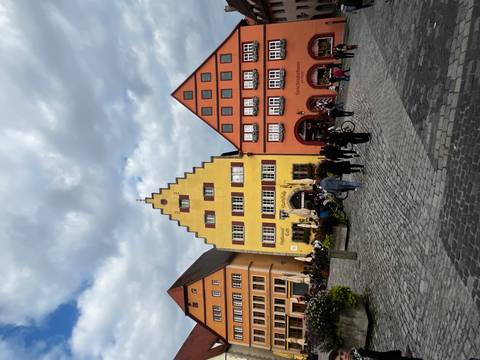       Colorful traditional German buildings in a plaza.
  