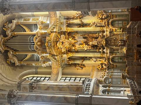Ornate church interior with grand altar.
