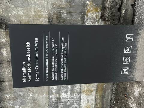 Sign indicating former crematorium area and execution sites.