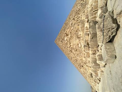 Side view of a pyramid under a clear sky.
