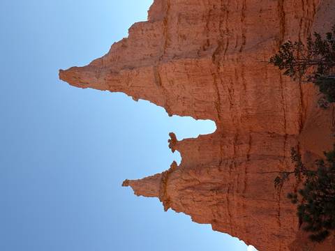 Rock formations under a blue sky.