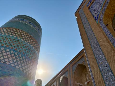Sunlit architectural details with intricate tilework.