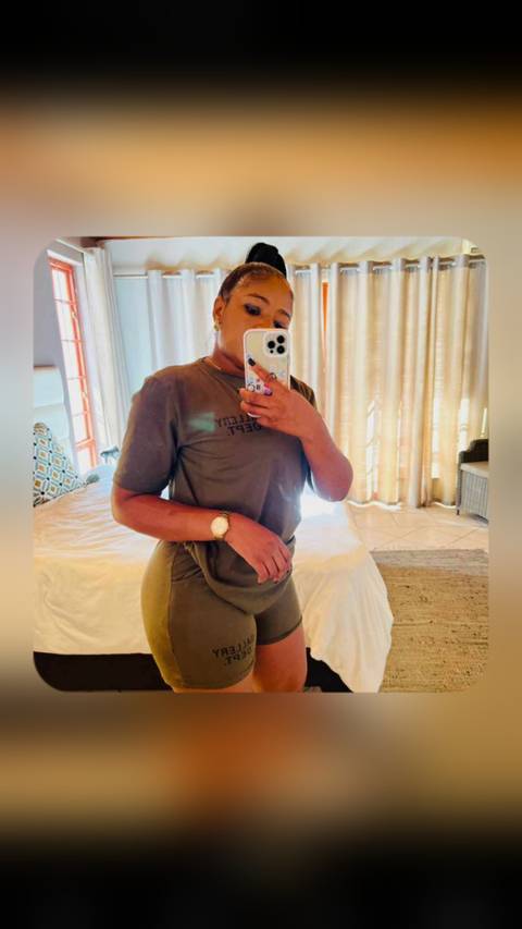 A person taking a selfie in a room.