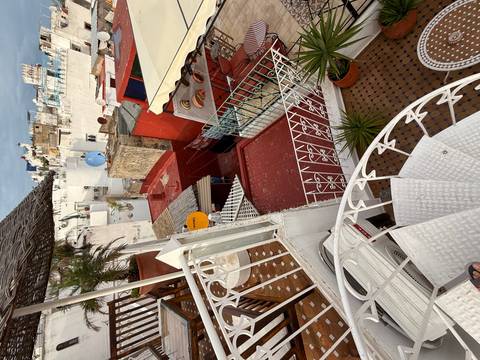       Sand dunes in the desert illuminated by sunset.
  