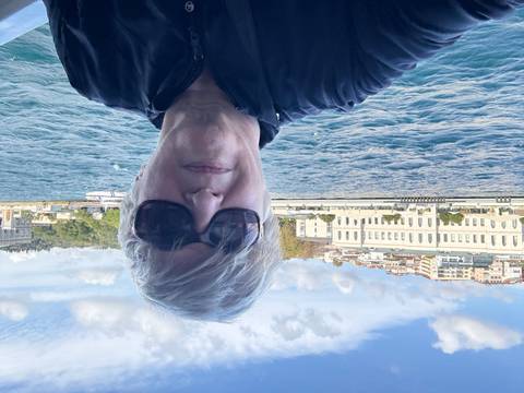 Person taking a selfie with the Bosphorus in the background.