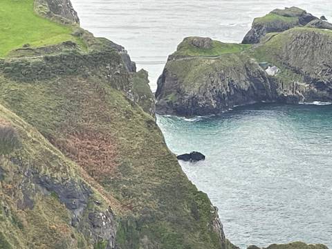       Scenic view of cliffs and a coastal area.
  
