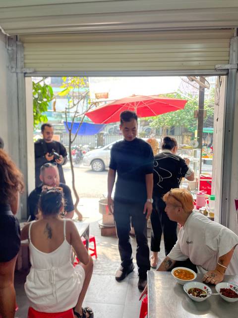 People in a busy food court or market