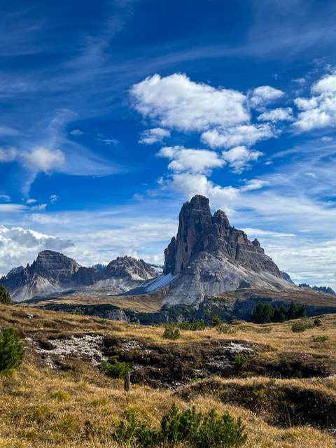 Majestic mountain peaks under a blue sky.