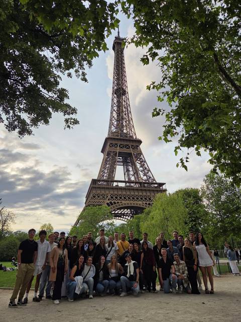 Iconic Eiffel Tower with trees surrounding