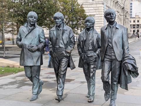       Statues of famous musicians in Liverpool.
  