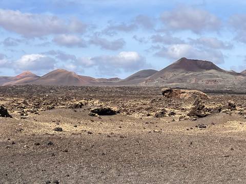       Lunar landscape with volcanic hills.
  