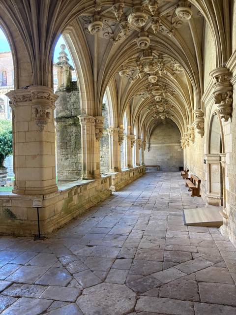 Architectural details of a cloister with arches.