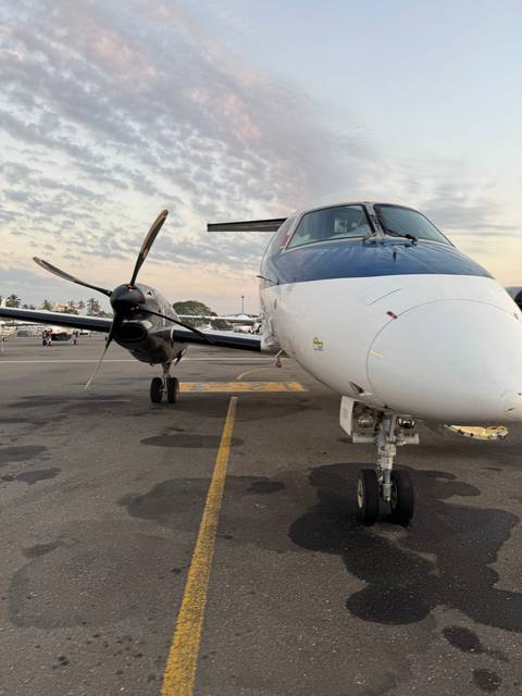       Close-up of an airplane on a tarmac.
  
