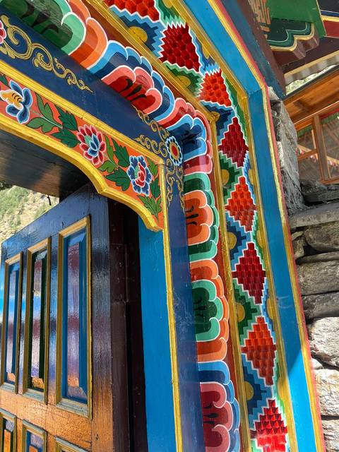 Close-up of a decorative gate with intricate patterns.