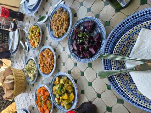 A table set with various traditional dishes and tableware.