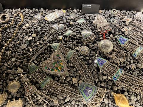 Collection of intricate jewelry on display