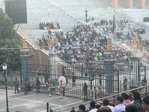       Ceremony stage at Wagah Border with spectators.
  