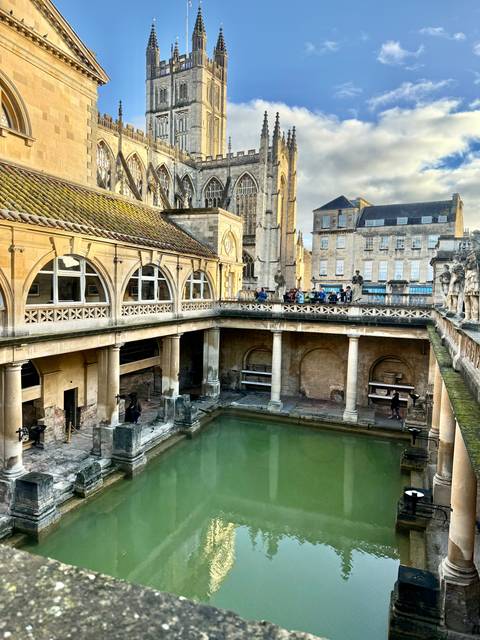 Roman bath complex with ancient architecture.