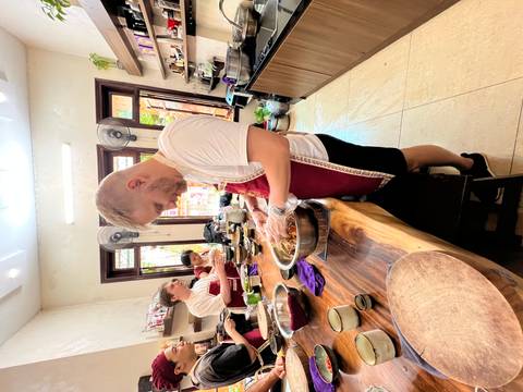 Person in apron preparing food.