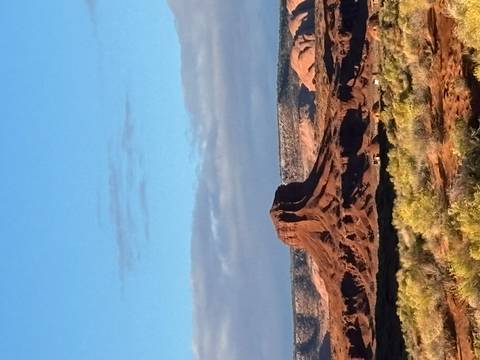       Desert landscape with distinct rock formations.
  
