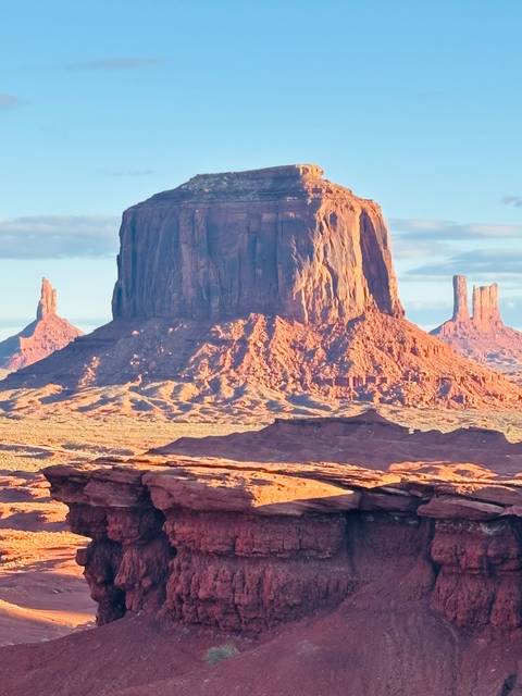       Monument Valley rock formations in bright light.
  