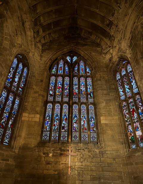 Stained glass windows inside a church.