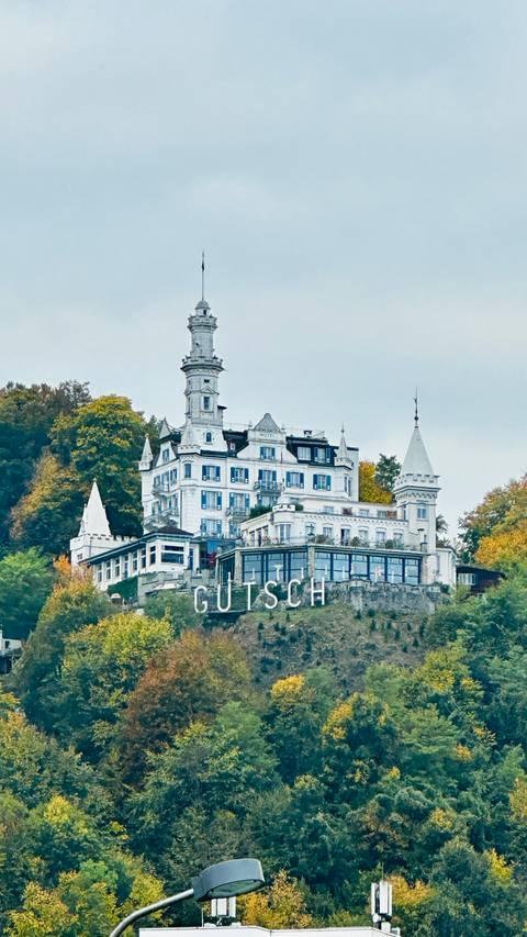 Hotel on a hill with the name 'Gutsch'.