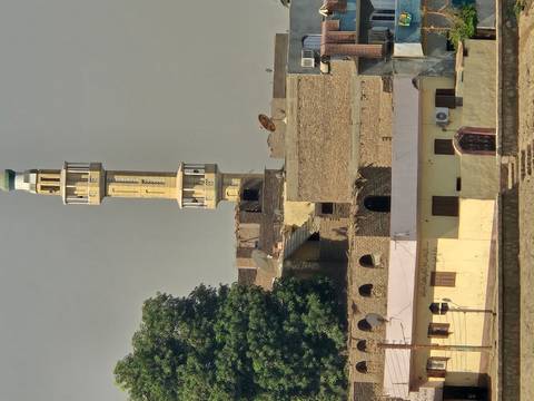 View of a minaret and residential buildings in Egypt.