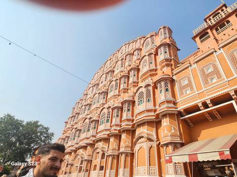       Hawa Mahal's facade with intricate lattice work.
  