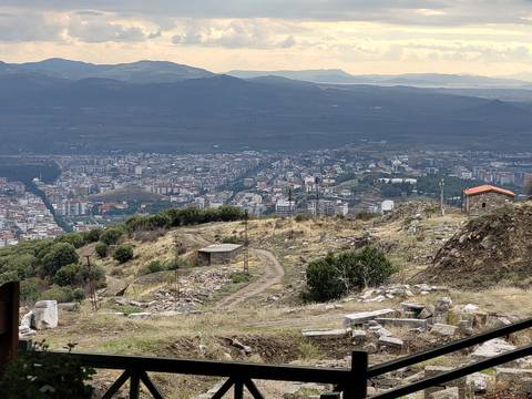 Scenic view from a hill overlooking a town.