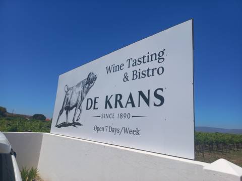       Sign for De Krans Wine Tasting &amp; Bistro.
  