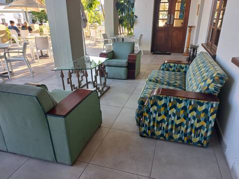       Outdoor seating area in a cafe.
  