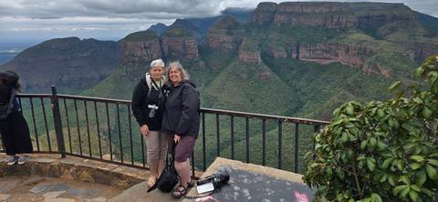 Two people at a scenic overlook.