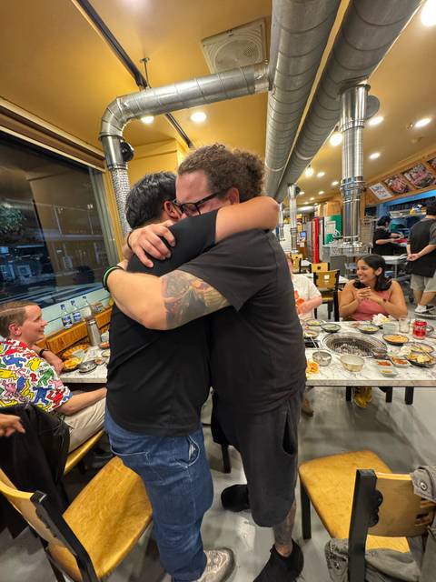People dining and enjoying a meal in a restaurant.