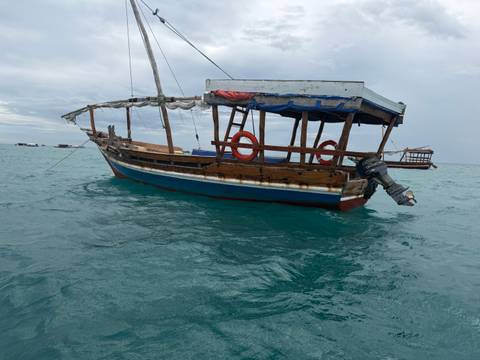 Traditional boat afloat in the sea.