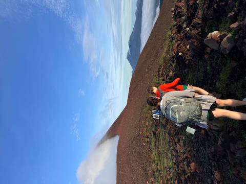 Group hiking on a mountain trail.